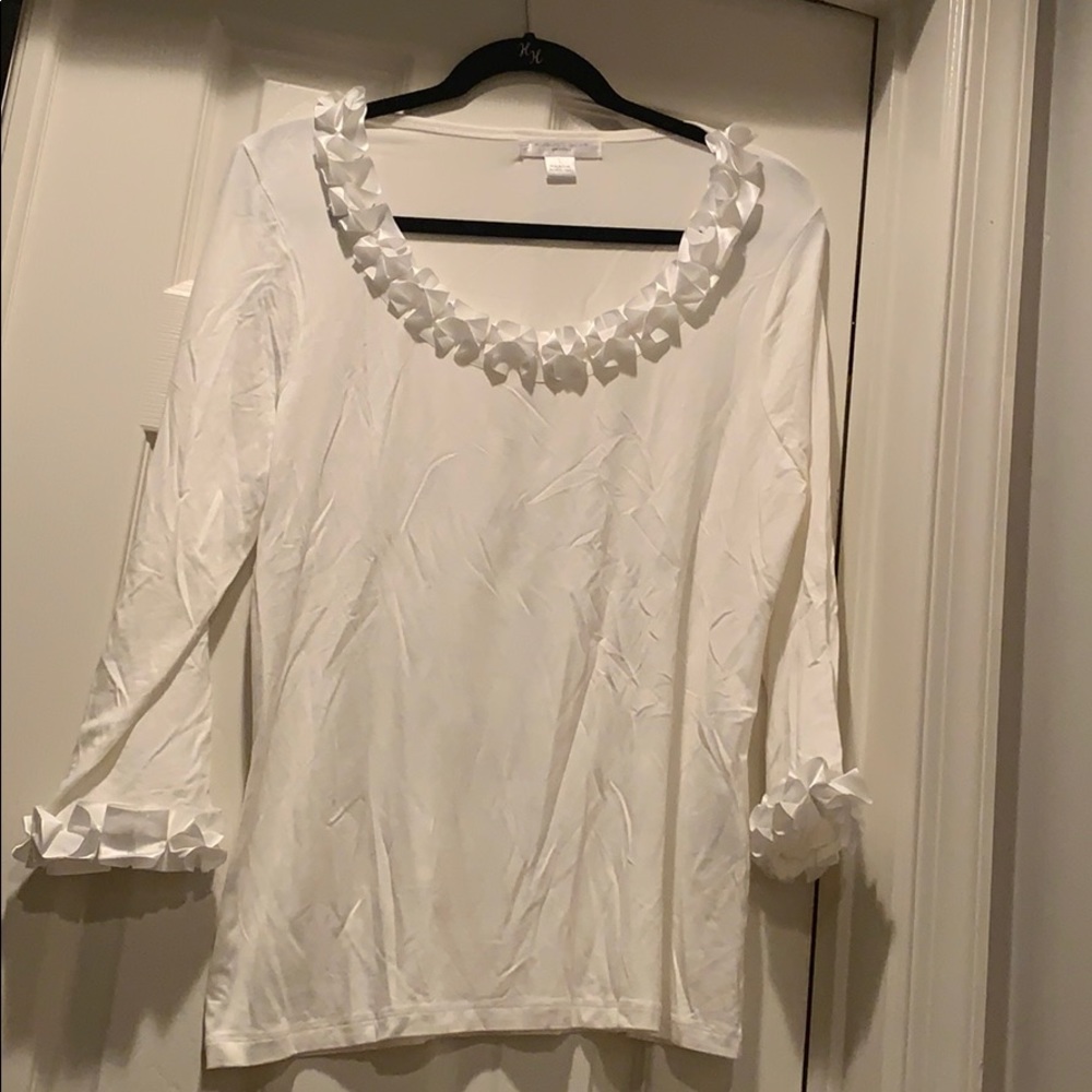 White blouse with ruffle trim